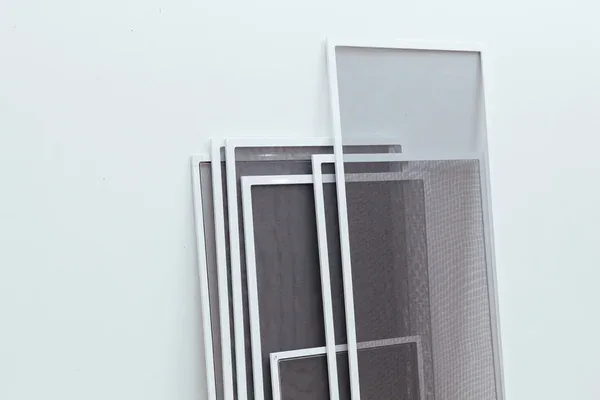 Separate mesh screen frames showing their construction